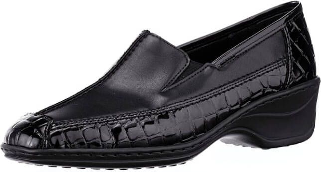 Jenny Instapper van een harmonieuze materialenmix Zwart